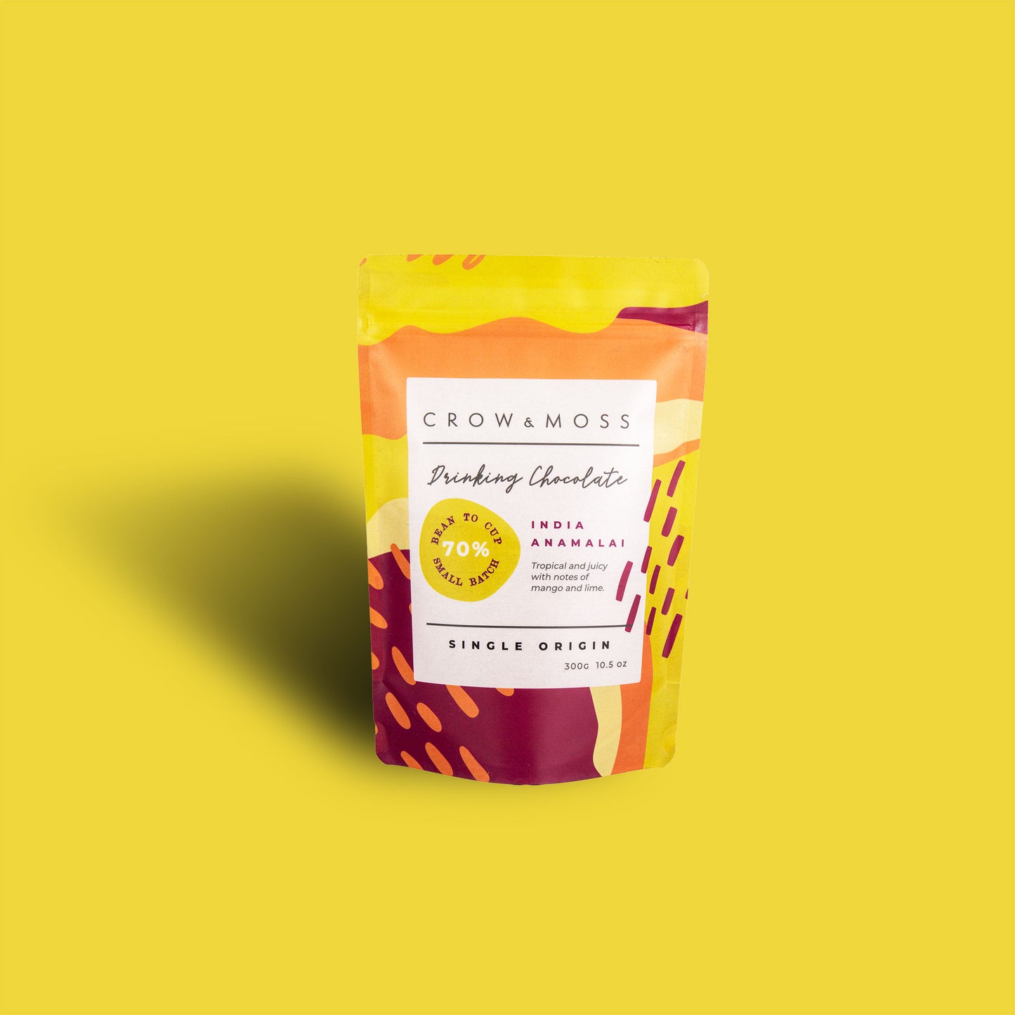 Image of a pouch of our India Anamalai Drinking Chocolate 70% on a yellow background.