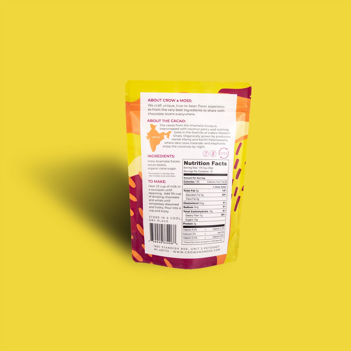 Image of the back of our packaging of our India Anamalai Drinking Chocolate 70% on a yellow background.