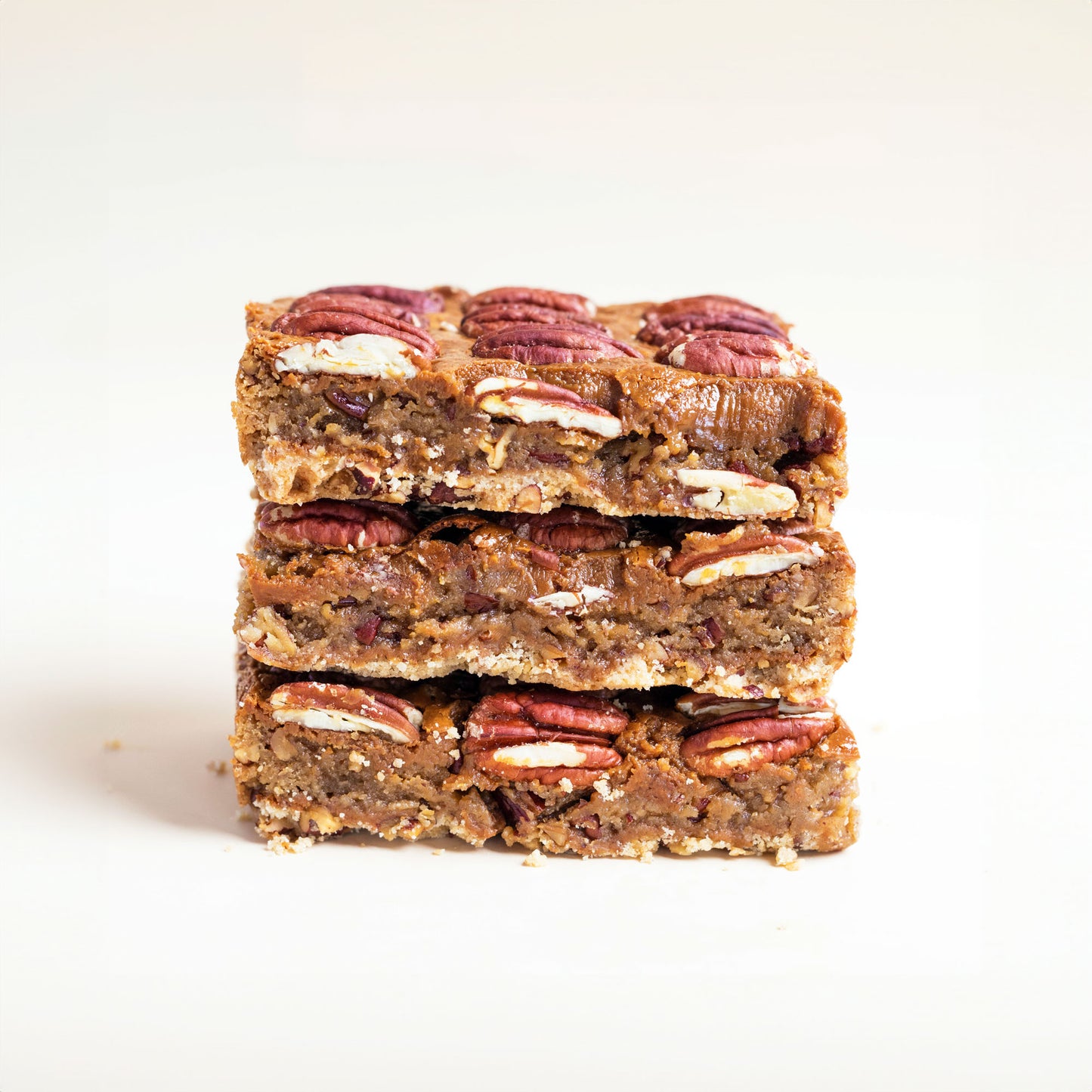 Stack of 3 Pecan Pie Blondie Bar on a white background.