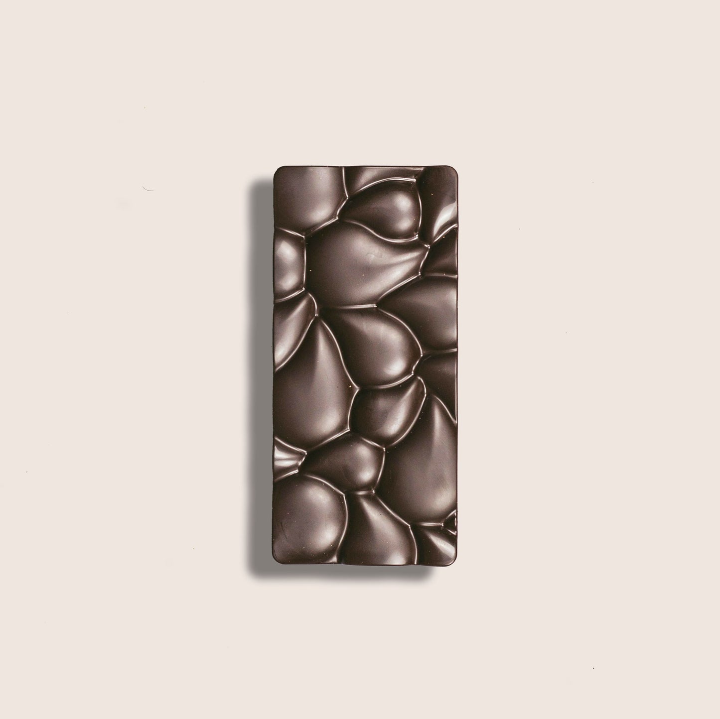 Image of the front of the bar of Banana Cardamom Brulee Dark Chocolate Bar 65%